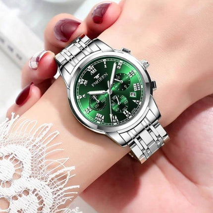 FNGEEN Elegant Ladies Quartz Watch with Luminous Date Display - silver bracelet green dial on wrist, 41.5mm luminous date, 30m water resistant, classic design