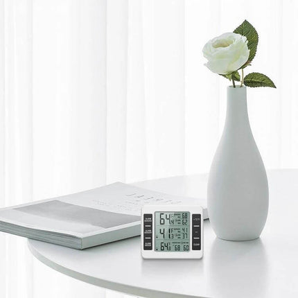 Home Wireless Refrigerator Thermometer With Low Temp Alarm displayed on a tabletop showing temperature and humidity readings