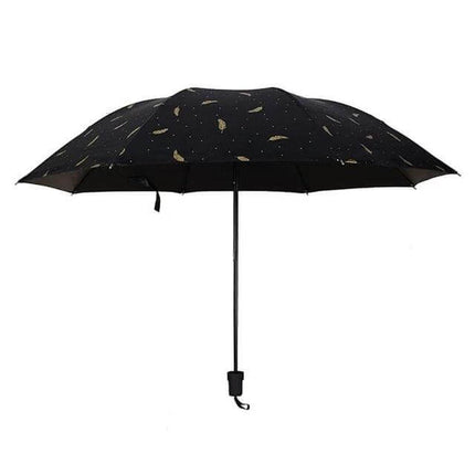 Feather Pattern Three-Folding Umbrella for Rain and Sun Protection – Compact black umbrella with gold feather print, manual 210T water‑resistant fabric