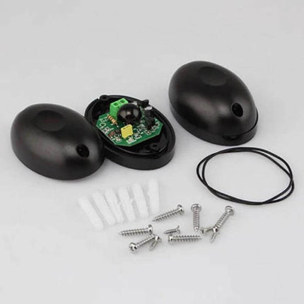 Single Beam Infrared Detector for Security and Doors with mounting screws and wiring, black housing and exposed circuit board
