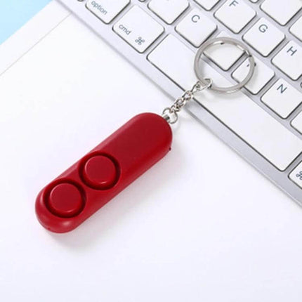Personal Safety Alarm Keychain for Everyday Protection - red pull-pin alarm keychain on keyboard for personal safety