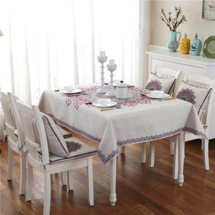 Retro Pattern Linen Table Cloth For Dinner 85x85cm displayed on a white dining table with matching cushions and pastoral decor