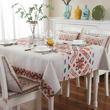 Retro Pattern Linen Tablecloth For Dinner, 140x140 Cm on a decorated dining table with geometric retro print and matching chair covers