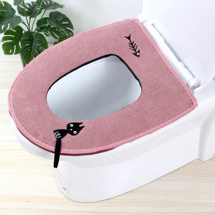 Cozy Washable Toilet Seat Cover for Cold Days pink corduroy cover with cat and fishbone design on toilet seat