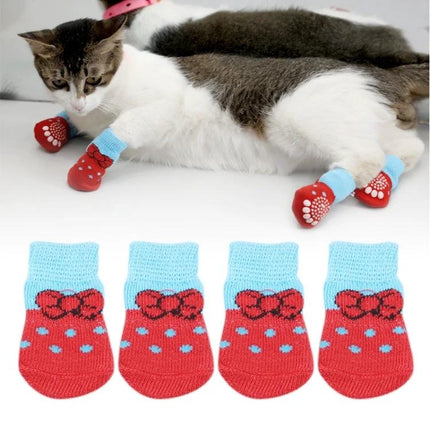 Cozy Socks for Small Dogs and Cats During Indoor Playtime - red non-slip pet socks on cat for cold floors and slippery surfaces