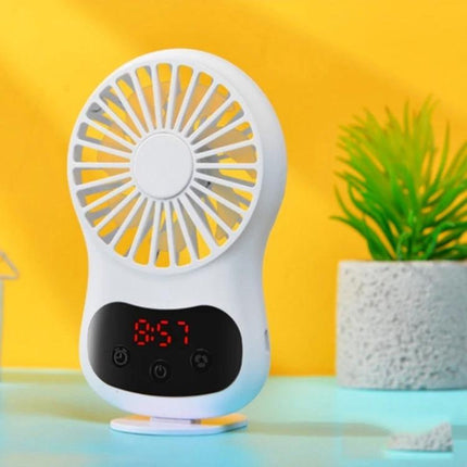 Compact Desktop USB Fan With Built-In Clock in white on desk showing digital time display, gentle airflow for home office or study