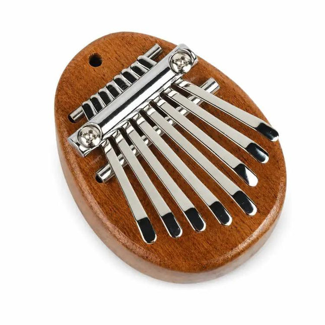A Compact Thumb Piano for Daily Musical Expression