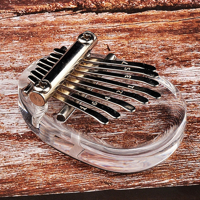 A Compact Thumb Piano for Daily Musical Expression