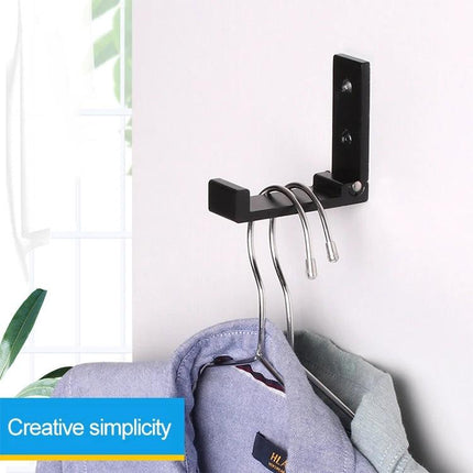 Versatile Wall Hooks for Daily Home Organization Tasks – black foldable wall hook holding coats and hangers in entryway