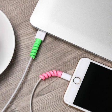 4 Pack Spiral Silicone Data Cable Protective Covers Anti Breakage Winder shown on phone and laptop cables in green and pink to prevent fraying and organize cords