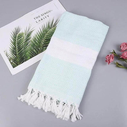 Striped Cotton Bath Towel With Tassels For Everyday Use folded mint stripe cotton-linen towel 100x180 cm with white tassels styled with palm print and roses