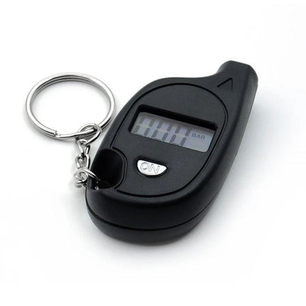 Essential Tire Pressure Gauge for Daily Vehicle Checks - compact digital keychain gauge showing LCD reading, ON button for quick accurate tire pressure checks