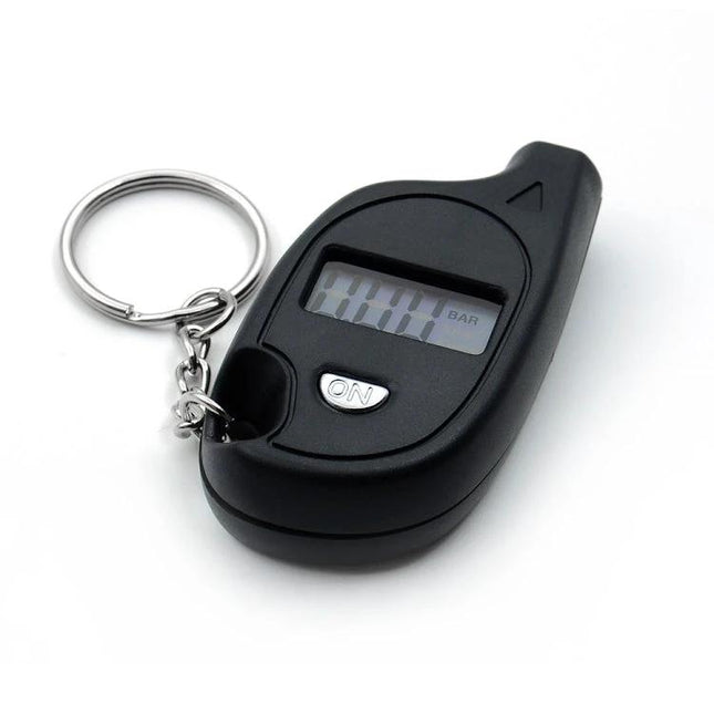 Essential Tire Pressure Gauge for Daily Vehicle Checks - compact digital keychain gauge showing LCD reading, ON button for quick accurate tire pressure checks