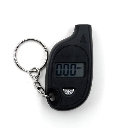 Essential Tire Pressure Gauge for Daily Vehicle Checks - compact digital keychain gauge showing 0.00 reading for quick accurate tire checks