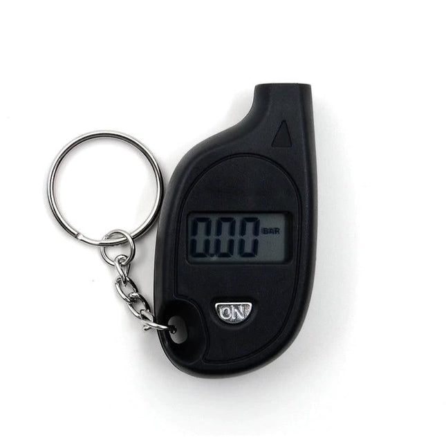 Essential Tire Pressure Gauge for Daily Vehicle Checks - compact digital keychain gauge showing 0.00 reading for quick accurate tire checks