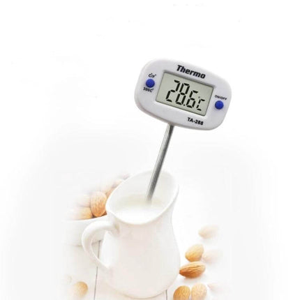 Digital Kitchen Thermometer With Stainless Steel Probe For Cooking inserted into milk jug showing 20.6°C on rotatable LCD display