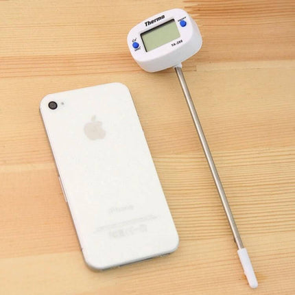 Digital Kitchen Thermometer With Stainless Steel Probe For Cooking - compact probe thermometer with 180° rotatable LCD on wooden surface