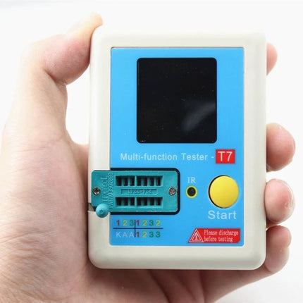 Handheld Multifunctional Tester for Electronic Components and Transistors in hand showing T7 socket and Start button
