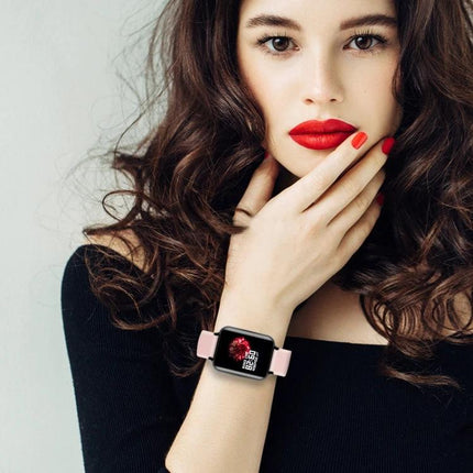 Daily Companion Smart Watch for Health and Activity Tracking on wrist of model displaying heart-rate screen, pink band, everyday fitness and sleep monitoring