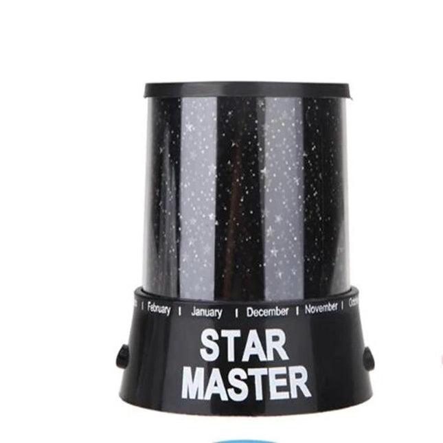 Starry Sky LED Night Light for Cozy Bedroom Evenings projecting starry sky pattern on ceiling, compact black Star Master design