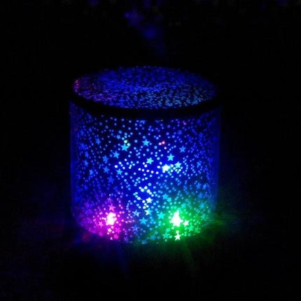 Starry Sky LED Night Light for Cozy Bedroom Evenings projecting blue and multicolor star pattern on ceiling for relaxing bedtime ambiance