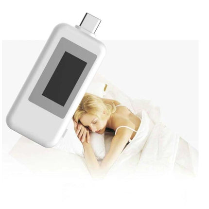 KEWEISI USB-C Voltage and Current Tester for Safe Charging Monitoring showing compact tester monitoring smartphone charging to prevent overheating