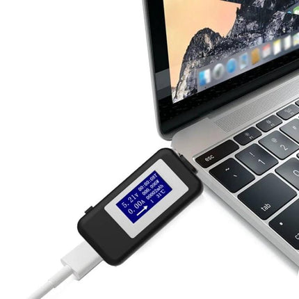 KEWEISI USB-C Voltage and Current Tester for Safe Charging Monitoring connected between laptop and USB-C cable showing voltage and current on screen