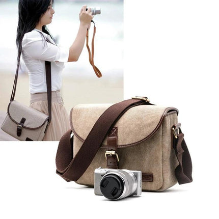 Practical Canvas Bag for Camcorder Storage and Daily Carry, 25x12x18cm shown with compact camera and adjustable shoulder strap for everyday shoots
