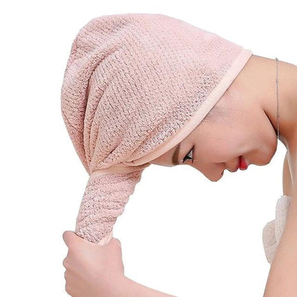 Quick-Drying Towel Cap for Daily Hair Care After Showers shown wrapped on woman absorbing moisture