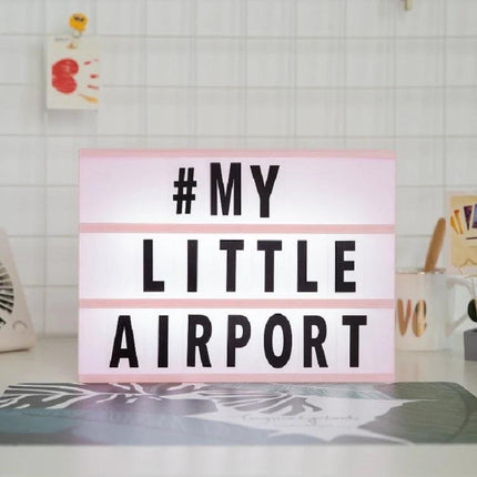 Handmade Alphabet Light Box for Home Decor and Nighttime Ambiance - pink lightbox displaying ‘# MY LITTLE AIRPORT’ for cozy bedroom decor