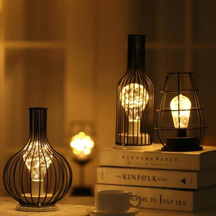 Retro LED Table Lamp for Evening Home Reading and Decor on bedside table with vintage iron cage and warm soft glow
