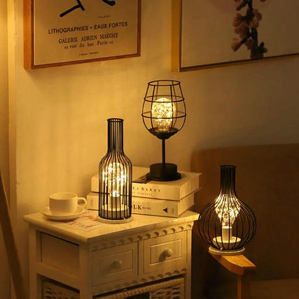 Retro LED Table Lamp for Evening Home Reading and Decor on bedside table with warm vintage iron cage lighting