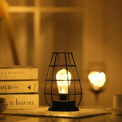 Retro LED Table Lamp for Evening Home Reading and Decor on bedside table with vintage iron cage and warm soft glow