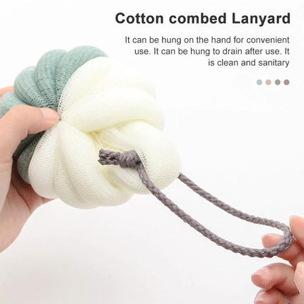 Soft Bath Brush for Daily Home and Travel Exfoliation showing compact cotton combed lanyard loop for hanging and easy packing
