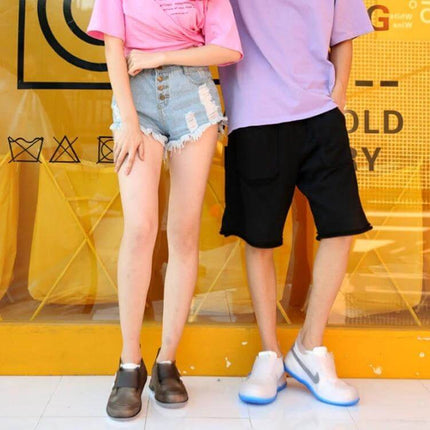 Low Toe Waterproof Shoe Covers for Men and Women Rain Protection shown on male and female models wearing low-cut waterproof shoe covers over casual shoes