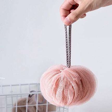 Bath Ball for Daily Skin Care During Home and Travel — compact pink mesh bath ball with hanging loop for gentle exfoliation at home or while traveling