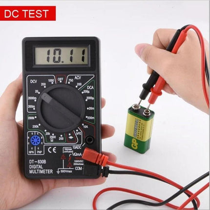Mini Digital Multimeter for Everyday Electrical Testing measuring 9V battery voltage with clear LCD display and probes