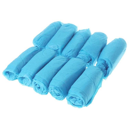 Disposable Non-Woven Shoe Covers for Indoor Floor Protection, 100 Pack — Blue non-woven disposable shoe covers rolled for visitors and workers