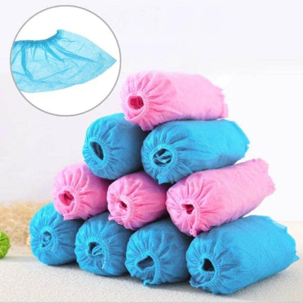 Disposable Non-Woven Shoe Covers for Indoor Floor Protection, 100 Pack - Stack of Blue and Pink Disposable Non-Woven Shoe Covers