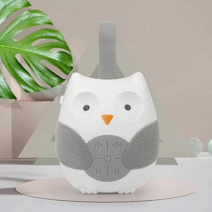 Gentle Owl Music Box for Baby's Bedtime Routine at Home — white owl-shaped sound machine with timer and play buttons for crib use
