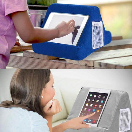 Multifunctional Cushioned Pillow Stand for Laptops and Tablets holding tablet upright on lap with side mesh pocket and cushioned support