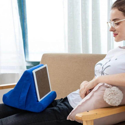 Multifunctional Cushioned Pillow Stand for Laptops and Tablets on lap holding a tablet for hands-free viewing