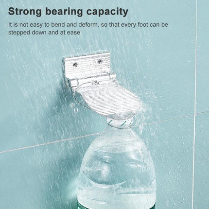 Wall-Mounted Foot Rest for Shower and Daily Bathroom Use - foldable stainless steel wall-mounted footrest shown holding weight in wet shower