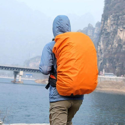 Waterproof Adjustable Rain Cover for Backpacks, 35L to 80L protecting large orange backpack during rainy hiking trip