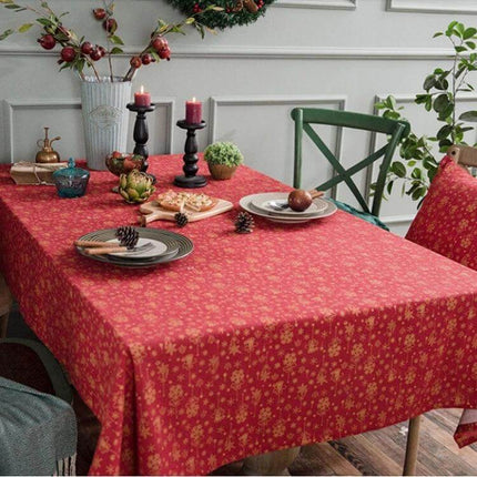 Linen Cotton Christmas Tablecloth 140x180 cm for Dining on decorated dining table with red lace-print pattern and festive place settings