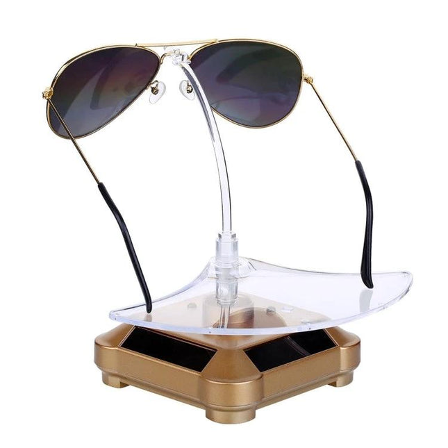 Solar-Powered Rotating Display Stand for Glasses with Lights showcasing aviator sunglasses on a clear rotating platform with colorful lights