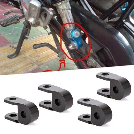 Shock Absorber Extender For Motorcycle, 5 cm Height Increase — black metal rear shock extender mounted on bike to raise ride height