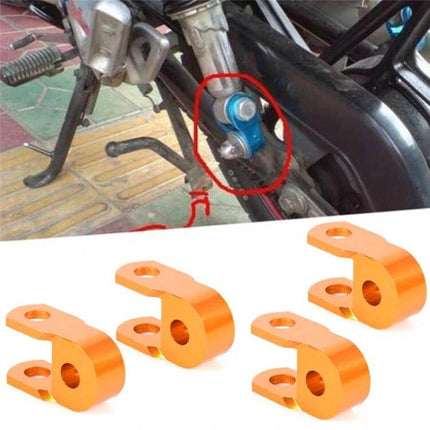 Shock Absorber Extender For Motorcycle, 5 cm Height Increase - orange rear shock extenders installed to raise bike ride height and clearance