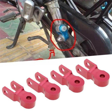 Shock Absorber Extender For Motorcycle, 5 cm Height Increase - red aluminum rear shock extender showing installed and set of four extenders