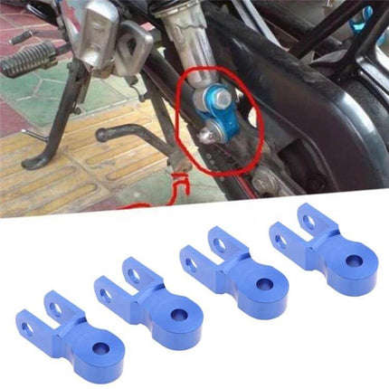 Shock Absorber Extender For Motorcycle, 5 cm Height Increase - blue aluminium rear ride height extender shown installed and four-piece set